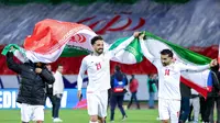 Iran menyusul Jepang untuk tampil di pesta akbar sepakbola tersebut. Iran mendapatkan tiket lolos itu setelah berimbang 2-2 kontra Uzbekistan di Azadi Stadium, Selasa (25/3/2025) malam WIB. Iran memang cuma butuh satu poin untuk lolos. (AFP)